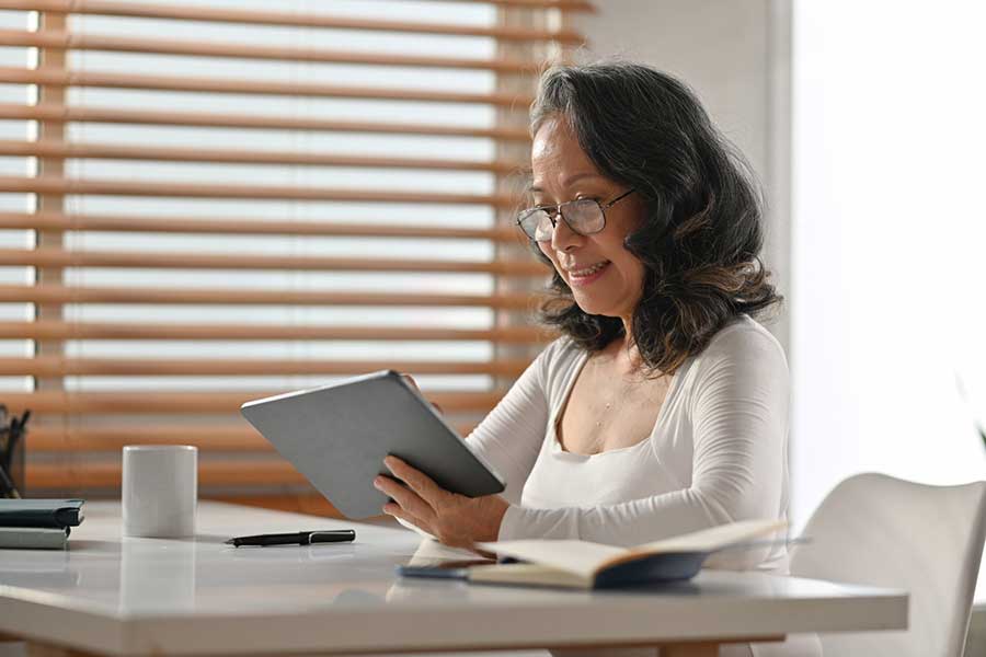 woman searching for old bank account online